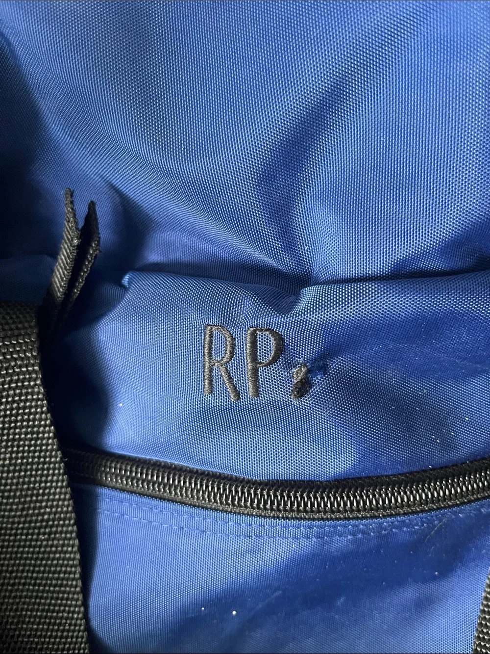 Blue and Black Duffel Bag one clip is broken. 10” x 20” x12”approximately